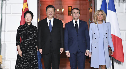 Xi meets Macron on maintaining sound China-France ties