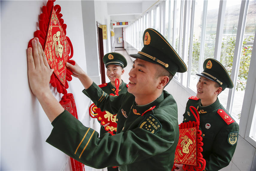 People's Armed Police soldiers decorate barracks to celebrate Chinese New Year