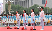 Chinese Communist Youth League members, Young Pioneers salute CPC