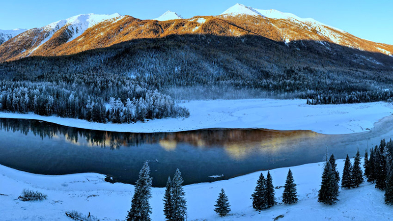 Snow-clad landscape brightens Kanas in NW China's Xinjiang