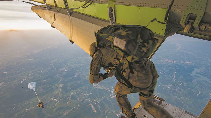 Airborne troops in parachuting training exercise