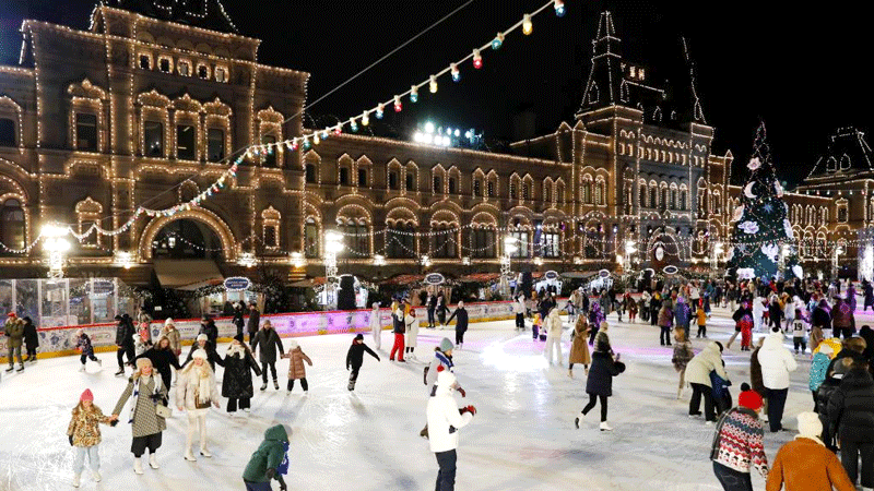 People skate on GUM ice rink at Red Square in Moscow