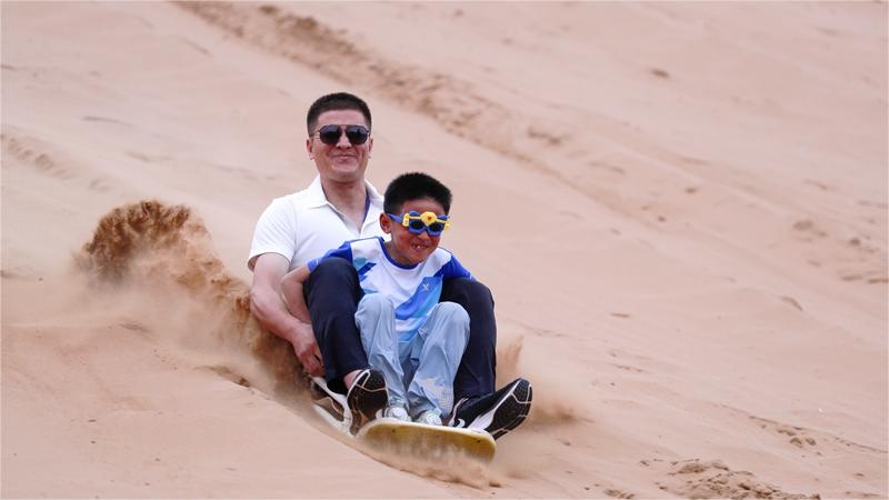 Sports enthusiasts embrace desert fun games in NW China's Ningxia