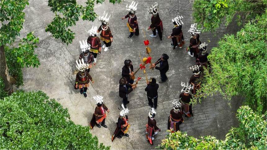 Sexagenarian couple safeguard millennia-old traditional dance in SW China's Guizhou